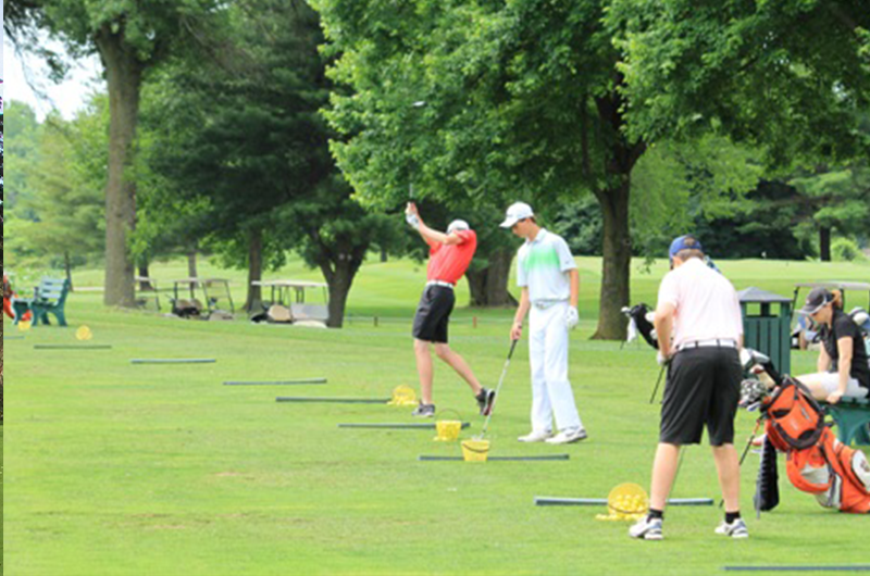 players on golf range